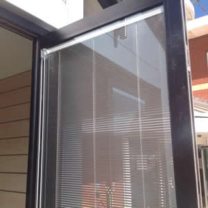 Blinds Embedded In Glass